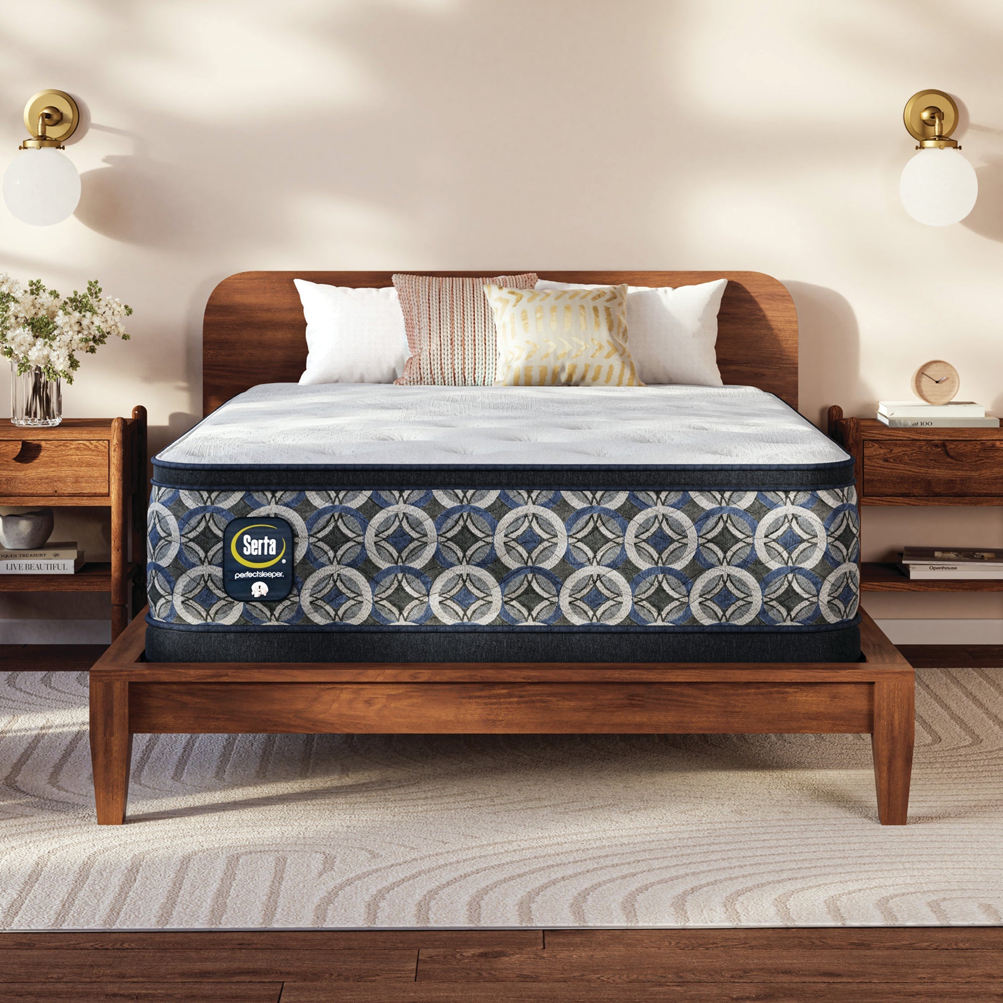 Serta perfect sleeper medium mattress on a wooden bed frame in a bedroom setting