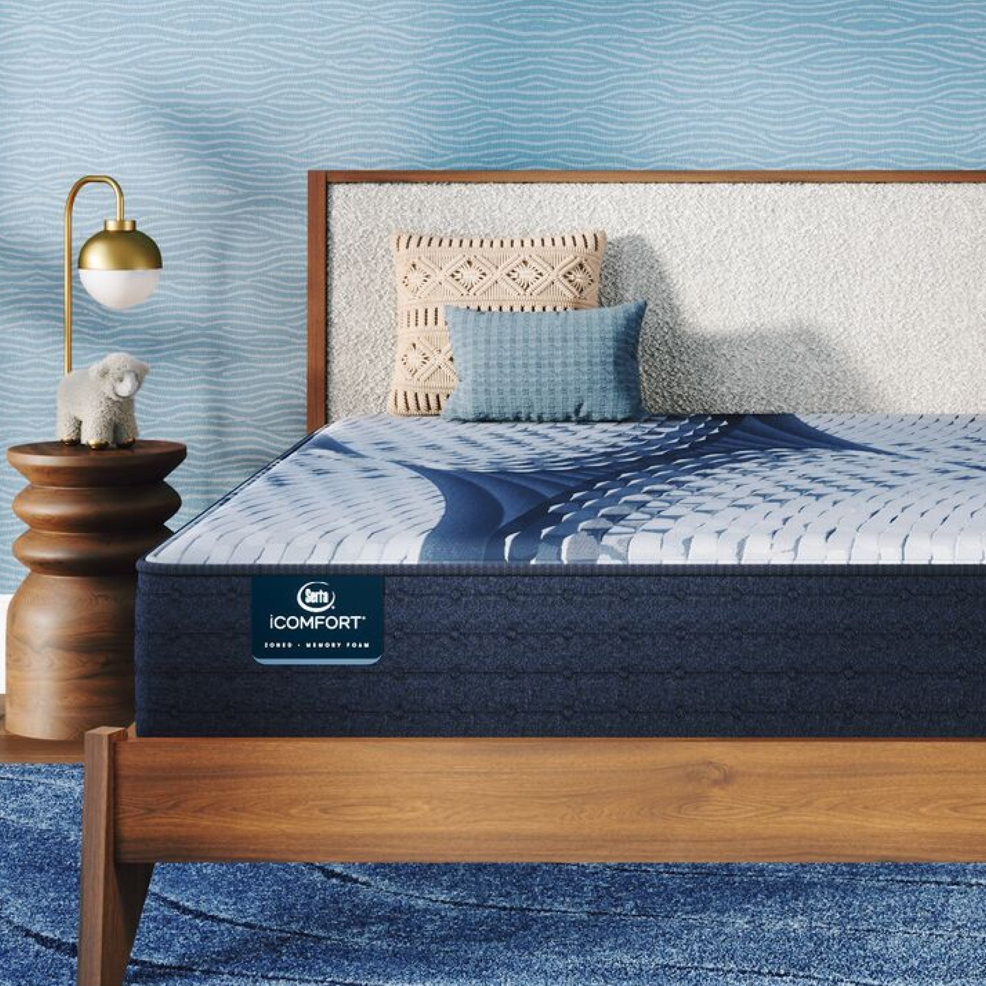 iComfort Elana Firm Mattress sitting in a brown bedframe || feel: firm || level: Standard - 11.5"