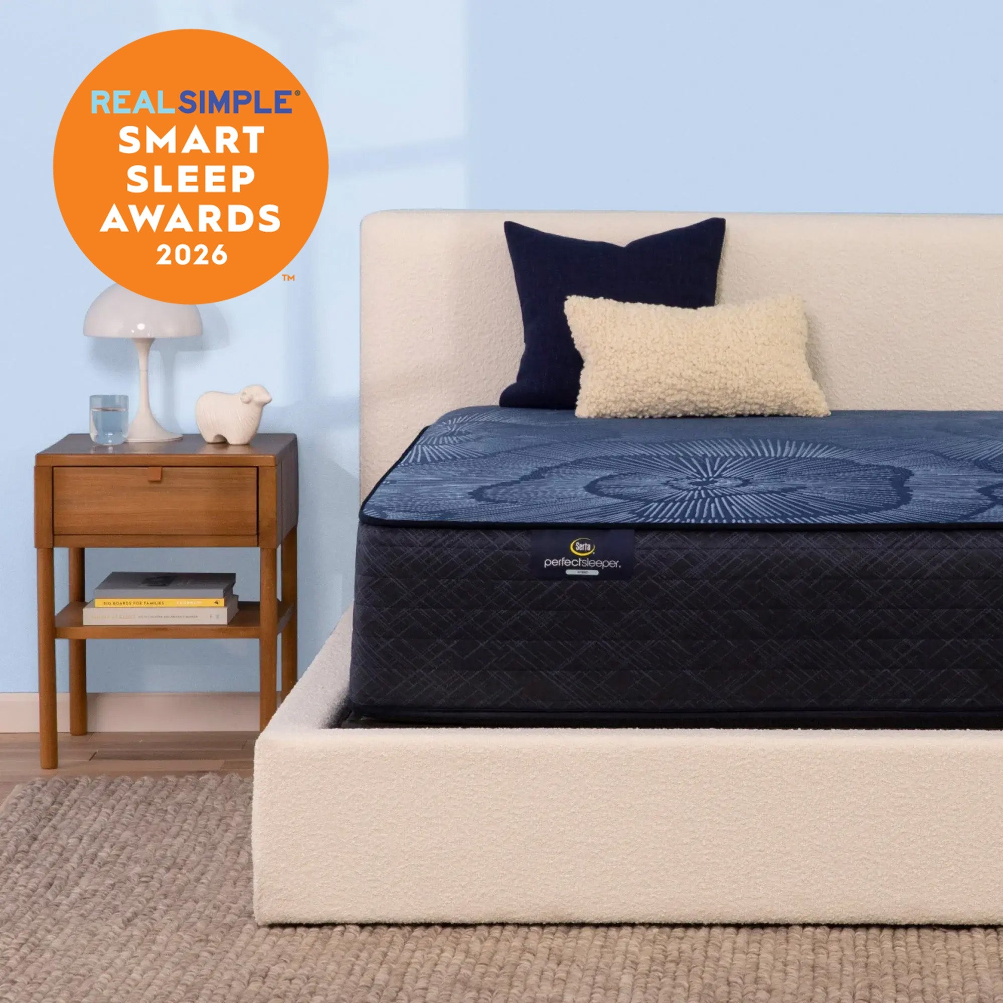 Serta Mattress on a bed with a nightstand and 'Real Simple Smart Sleep Awards 2026' badge.