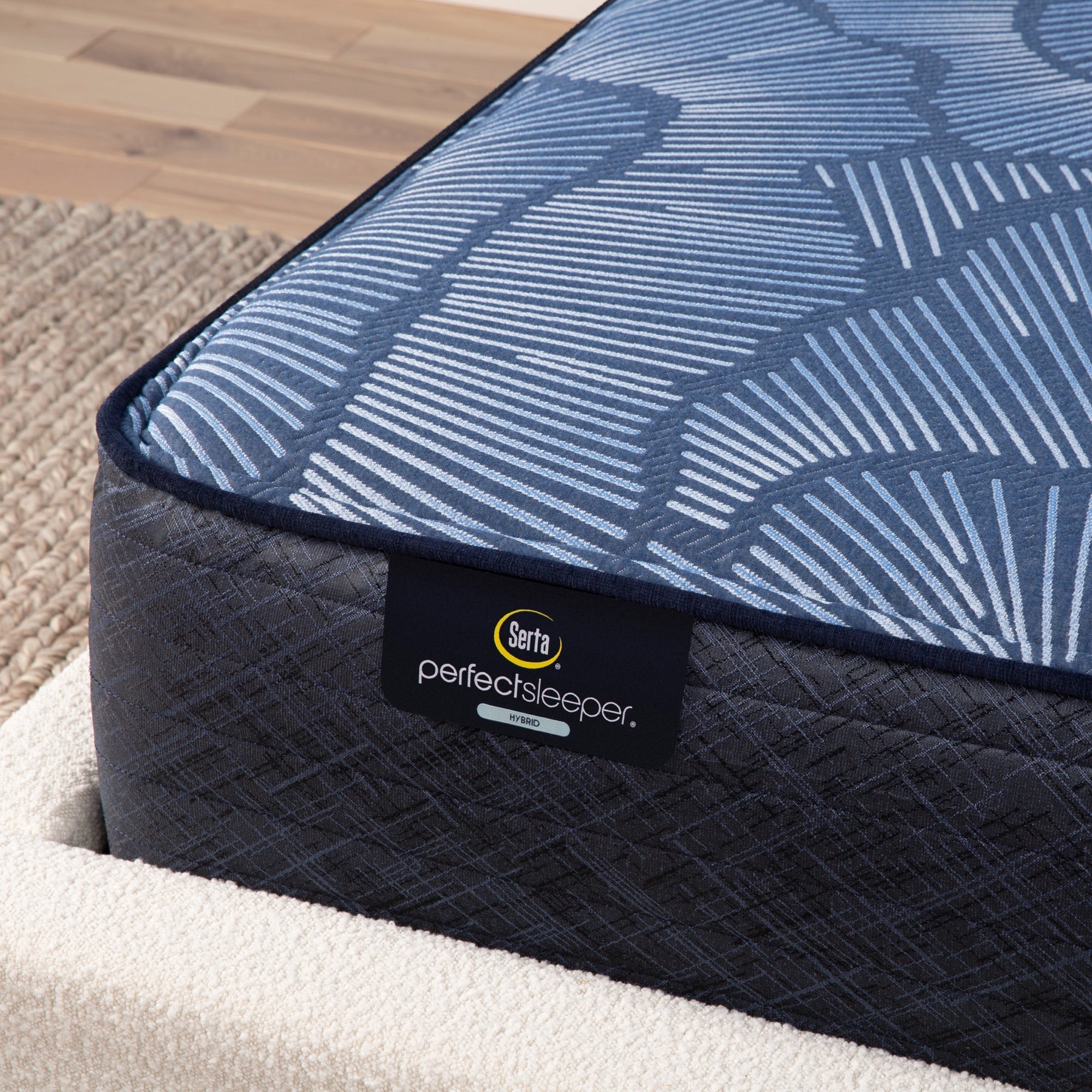 Corner view of Serta Perfect Sleeper plush mattress||feel: firm||level: enhanced